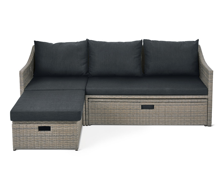 Graues Lounge-Schlafsofa »Thore« mit Ausziehfunktion und dunkelgrauen Kissen.