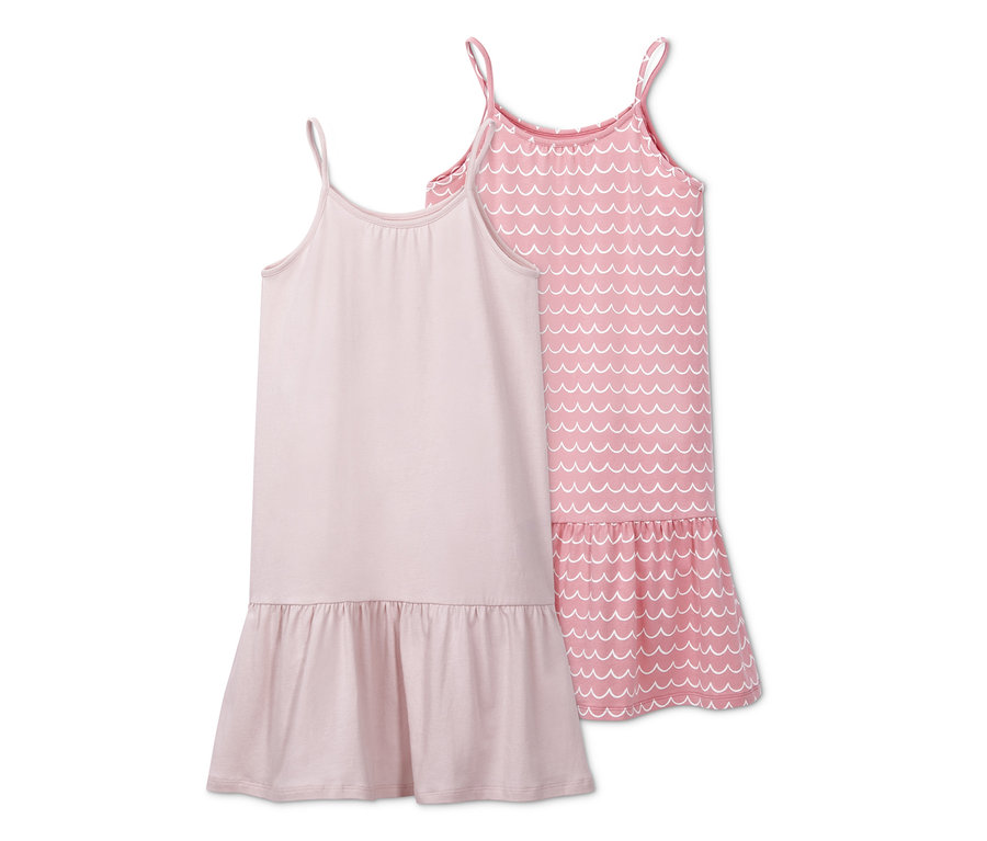 Zwei Jerseykleider mit Spaghettiträgern, eines hellrosa und eines rosa mit weißem Wellenmuster.