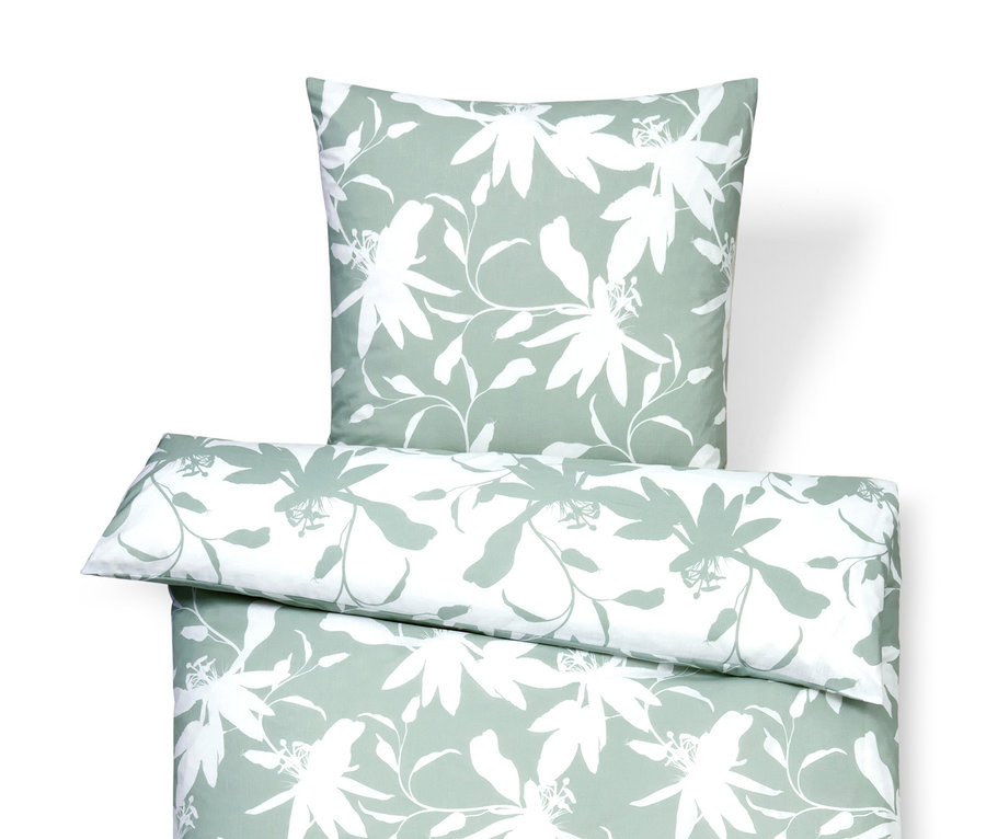 Bettwäsche-Set mit grünem Blumenmuster.