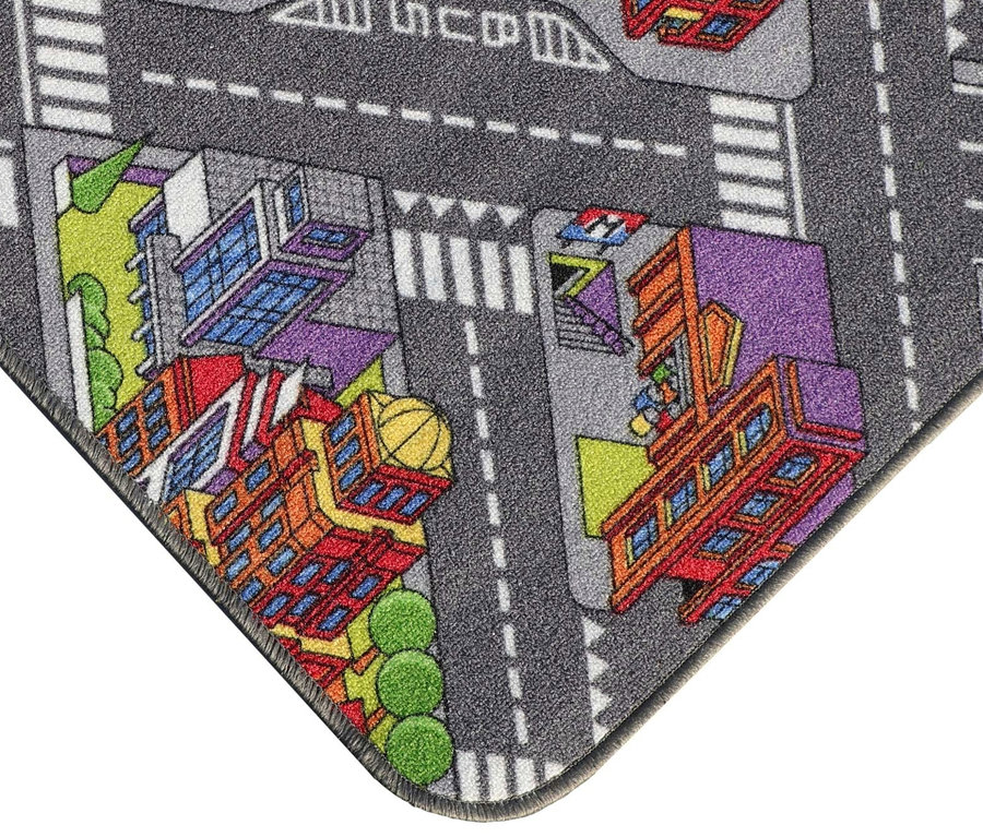 Detail einer Ecke des Spielteppichs »BIG CITY« mit Gebäuden und Strassen.
