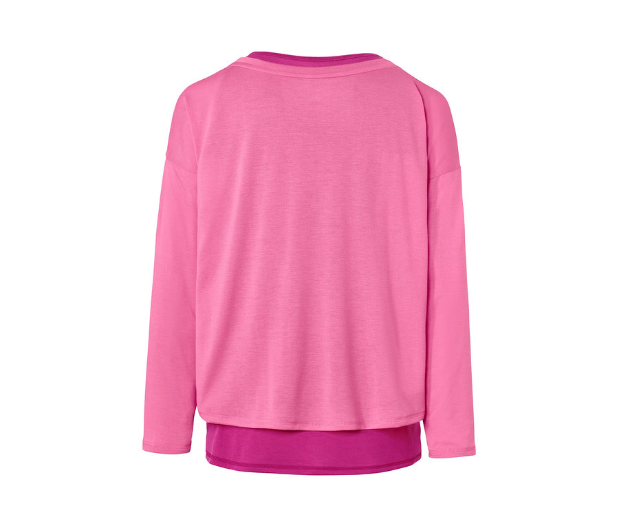 Detailansicht des 2-in-1-Sportshirts in Pinktönen.