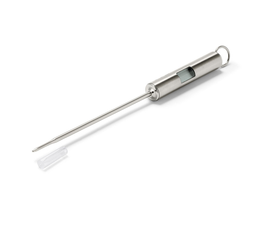 Ein Braten-Thermometer aus Edelstahl mit digitaler Anzeige und Schutzkappe für die Spitze.