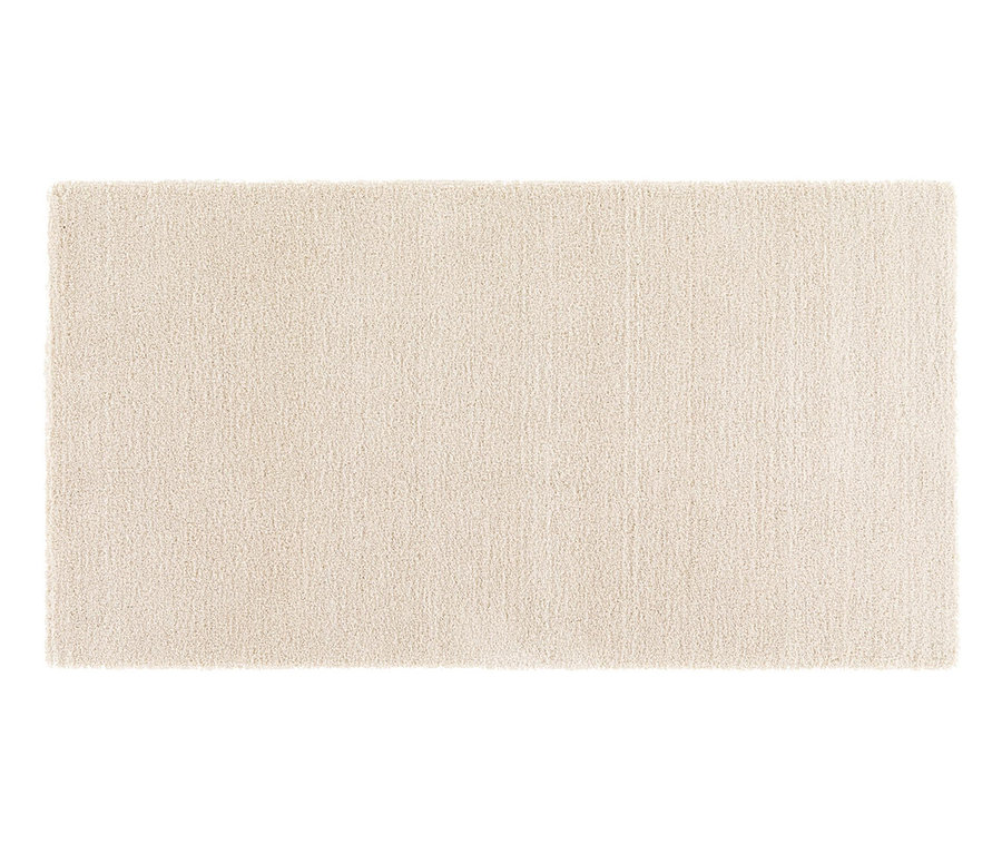 Ein wollweißer Teppich.