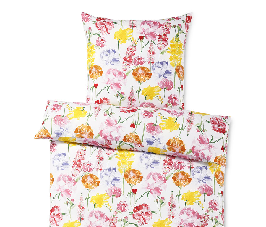 Weiße Microfaser-Bettwäsche mit Blumenmuster.