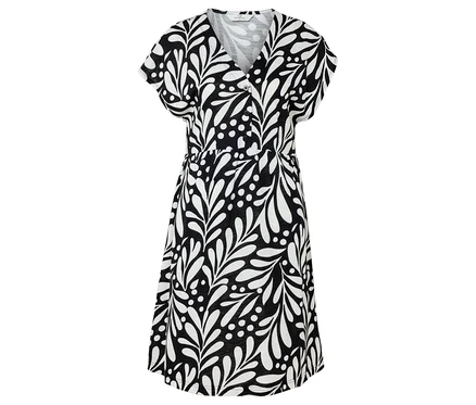 Ein schwarzes Kleid mit weißem Blattmuster ist zu sehen.