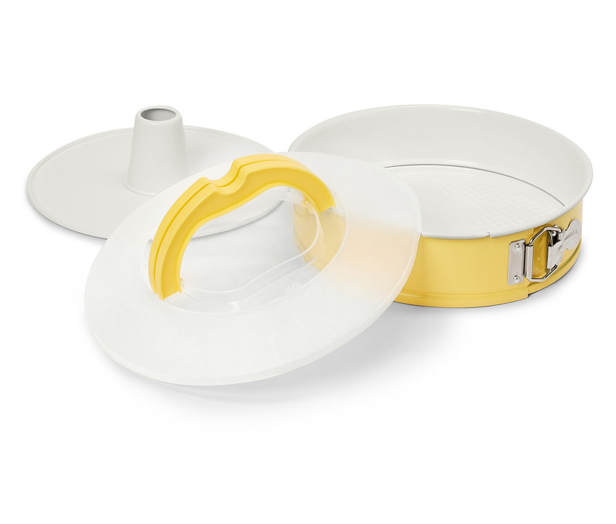 Gelbe Springform mit Hebeboden und Deckel.