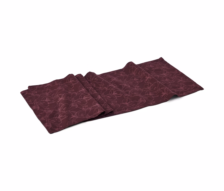Ein weinroter Jacquard-Tischläufer mit Blumenmuster.