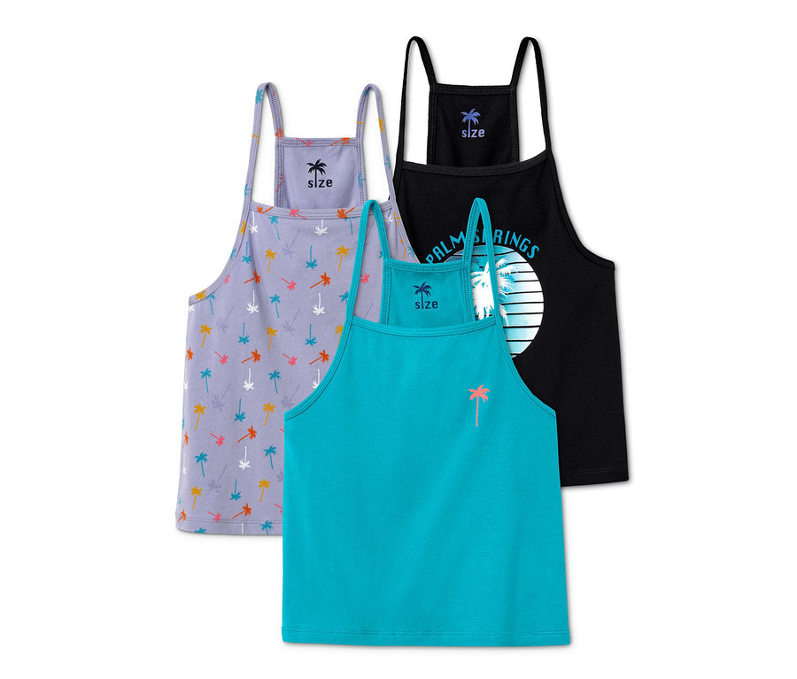 Drei Tops: Lavendelfarben mit Palmenmuster, Türkis mit einer Palme und Schwarz mit dem Aufdruck Palm Springs.