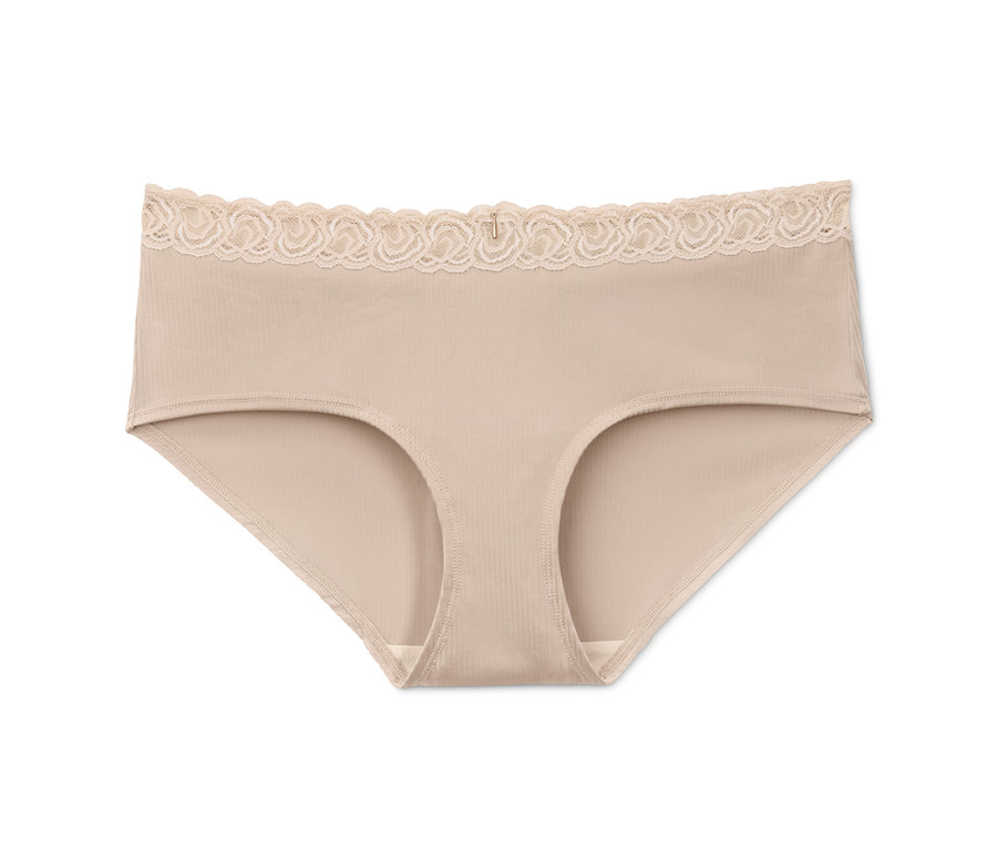 Eine einzelne hautfarbene Panty mit Spitze.