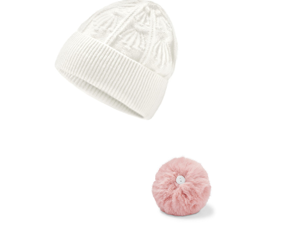 Weiße Strickmütze mit Bommel und separatem rosa Bommel.