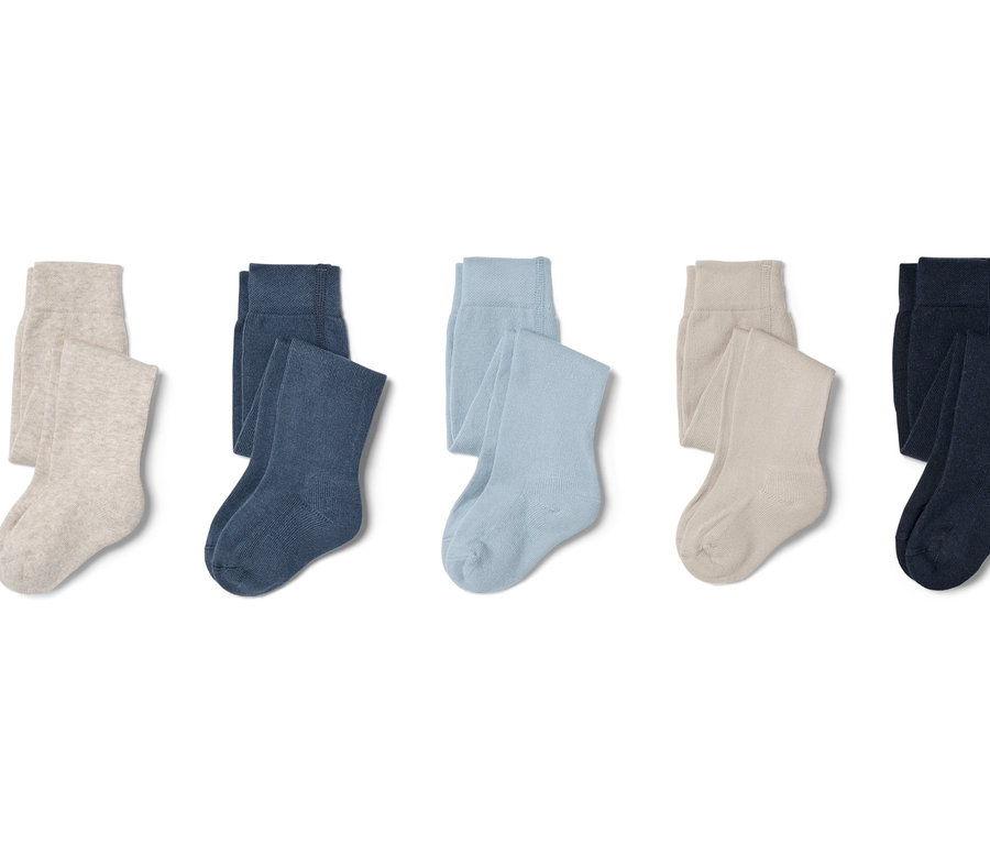 Fünf blaue Kinder-Baumwollstrumpfhosen.