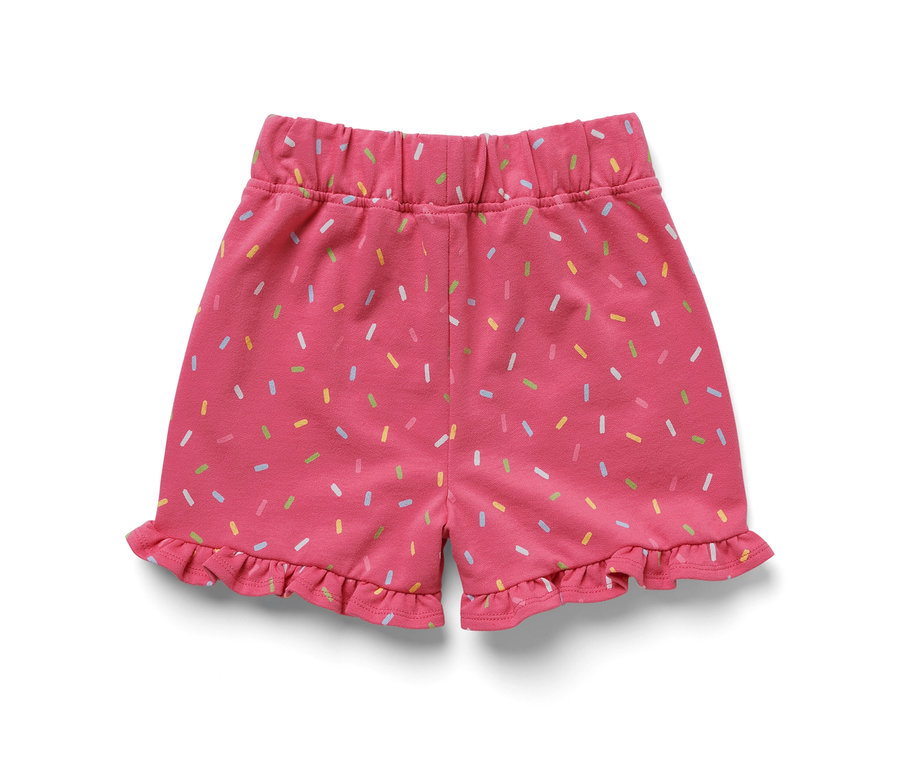 Rosa Kinder-Sweat-Shorts mit bunten Streuseln und Rüschen.