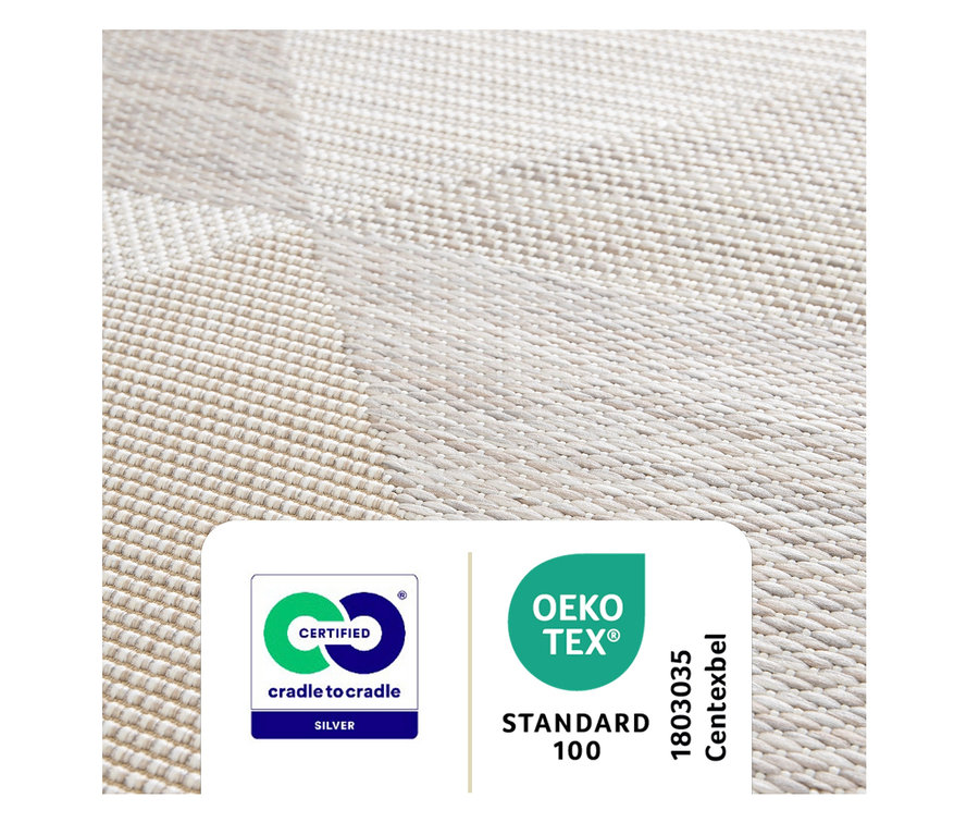 Detailaufnahme eines beigen Outdoor-Teppichs.
