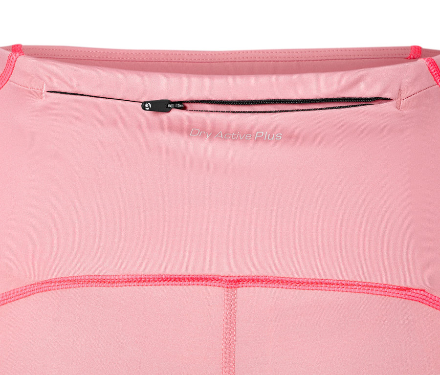 Detailansicht einer rosafarbenen Performance-Sporttight mit Reißverschlusstasche.