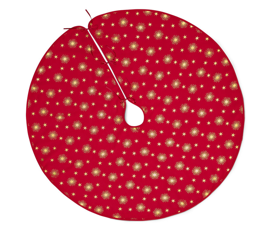 Roter Weihnachtsbaumständer mit goldenen Sternen und Sonnenmotiven.