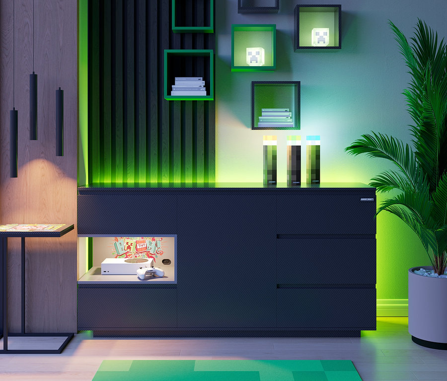 Ein roba Minecraft Sideboard in Anthrazit mit Schubladen und offenem Fach mit Spielkonsole und Controller, daneben ein Tischchen und eine Palme.
