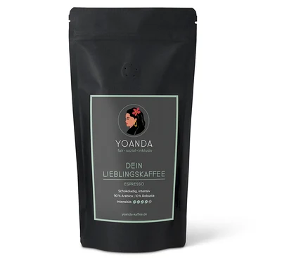 Eine schwarze Tüte YOANDA Lieblingskaffee Espresso mit der Aufschrift "Schokoladig, intensiv 90% Arabica | 10% Robusta".