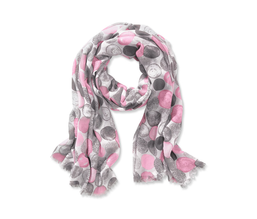 Ein Schal mit rosa und grauen Punkten.