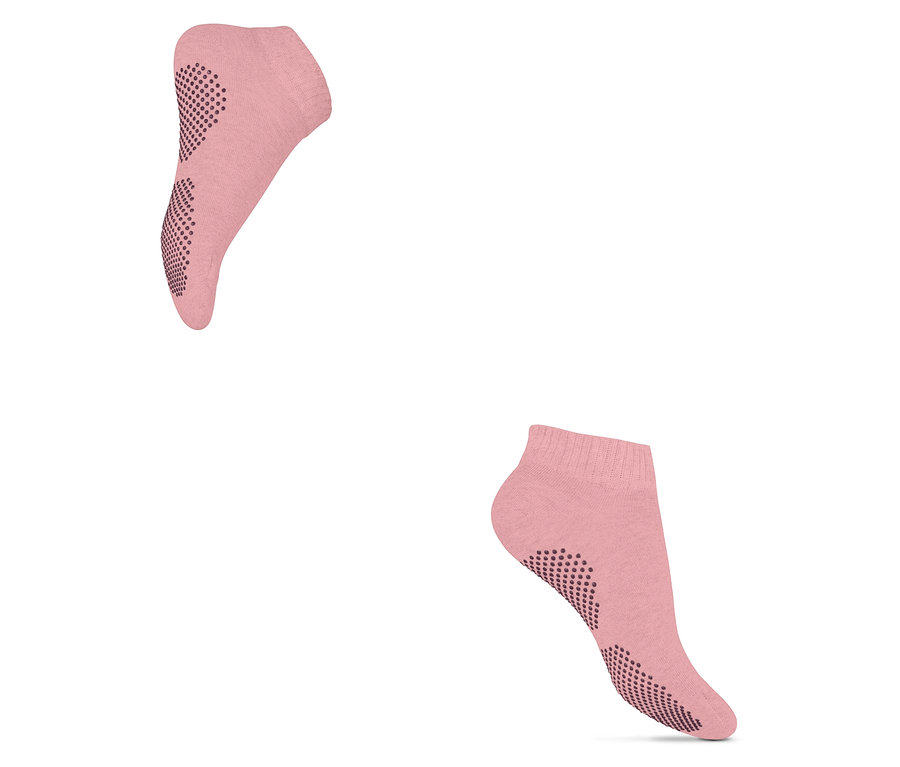 Zwei Paar rosa Yogasocken mit Antirutschsohle.