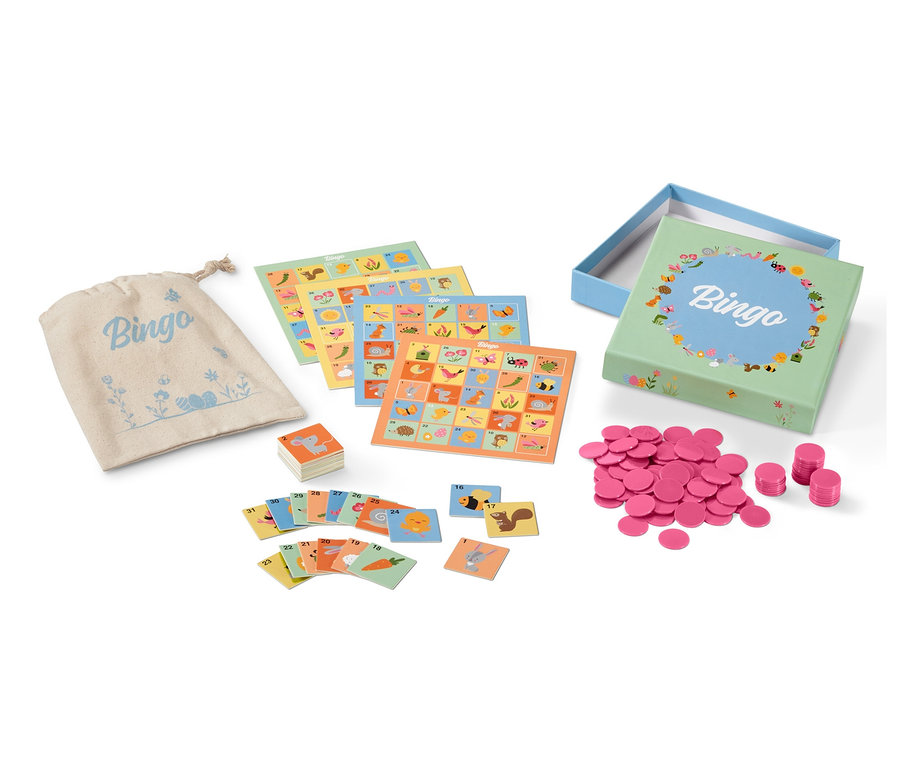 Brettspiel »Osterbingo« mit Spielkarten, Chips und einem Beutel.