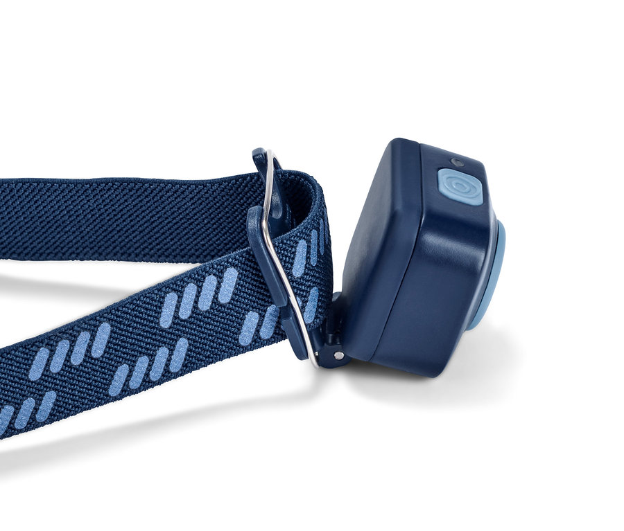 Detailansicht einer blauen, kompakten Stirnlampe.