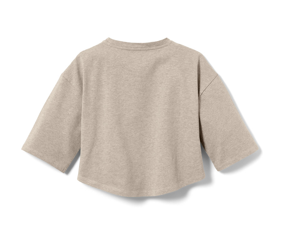 Detailansicht eines beigen Jersey-Pyjamaoberteils.