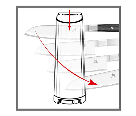 Eine Illustration des schwarzen ZWILLING Messerschärfers »V-Edge« mit einem roten Pfeil, der die Bewegung beim Schärfen eines Messers zeigt.