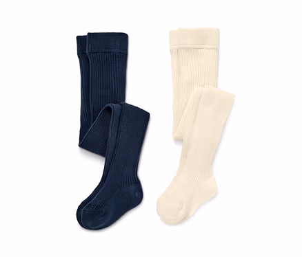Zwei einfarbige Kinder-Strumpfhosen: marineblau und creme.