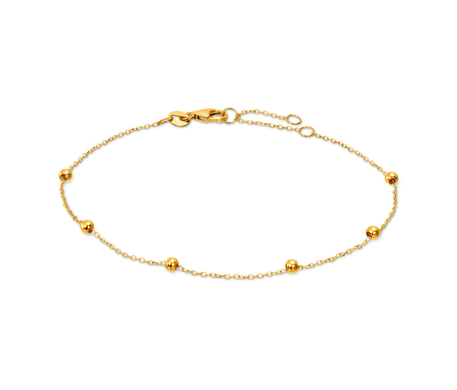 585 Gold Armband Kugeln und 375 Gold Armband Kugeln auf weißem Hintergrund.