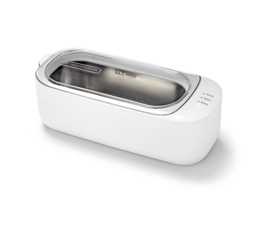 Weißer Ultraschallreiniger mit durchsichtigem Deckel.