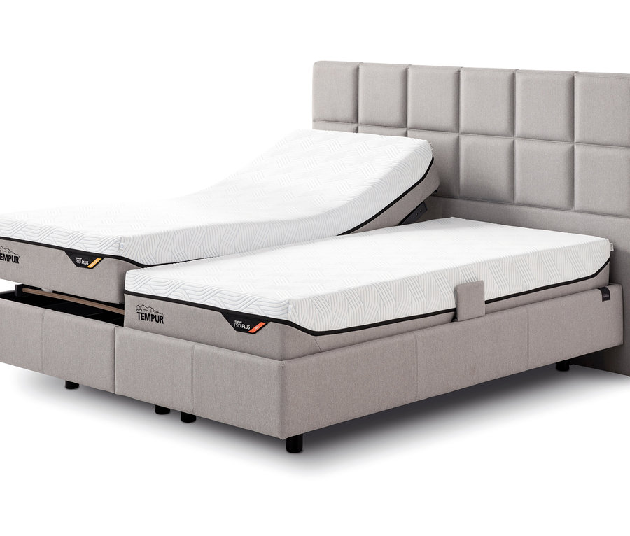 Zwei graue verstellbare Bettsysteme mit weißen Matratzen und Kopfteil. TEMPUR® Systemrahmen elektrisch verstellbarer Lattenrost »Premium Flex 3000«, 90 x 200 cm.