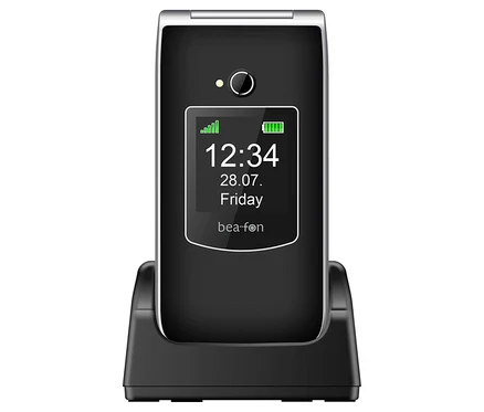 Schwarzes Bea-fon SL605 LTE Mobiltelefon in Ladestation.
