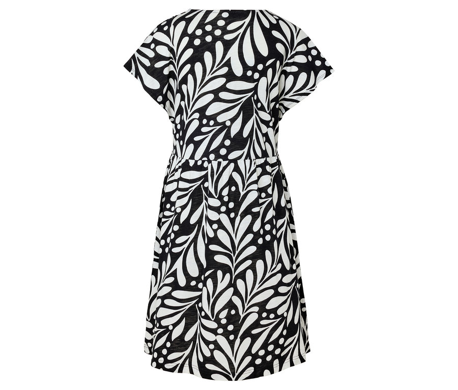 Schwarzes Kleid mit weißem Blattmuster.