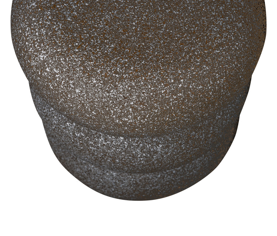 Nahaufnahme eines strukturierten, mehrstufigen, bronzefarbenen Objekts mit unebener Oberfläche vor weißem Hintergrund.