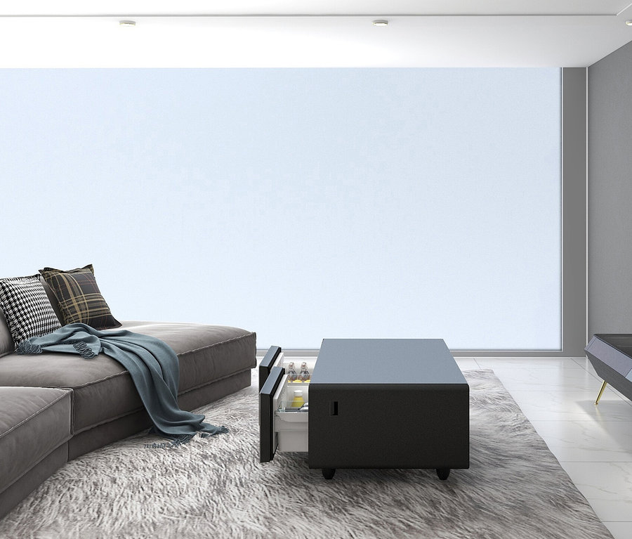 Wohnzimmer mit grauer Couch und schwarzem Caso Sound & Cool.