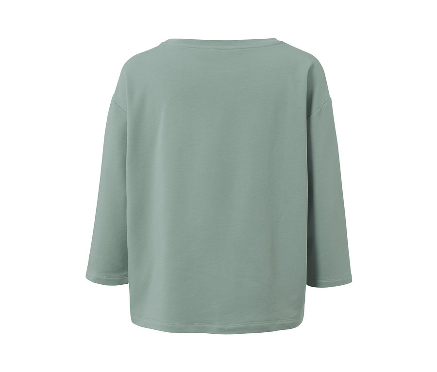 Grüner Loungewear-Anzug mit langen Ärmeln.