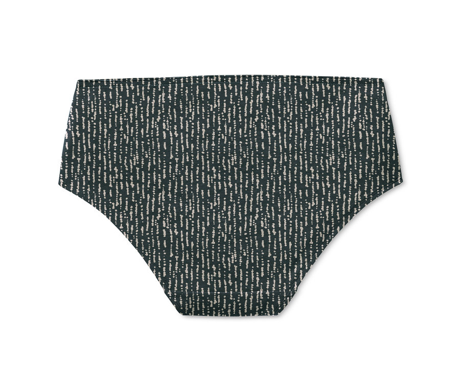 Eine dunkelgrüne Panty mit cremefarbenem Muster.