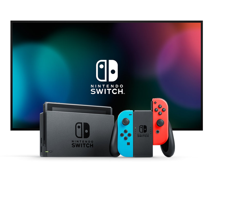 Schwarze Nintendo Switch-Konsole mit blauem und rotem Joy-Con-Controller vor einem Fernseher.