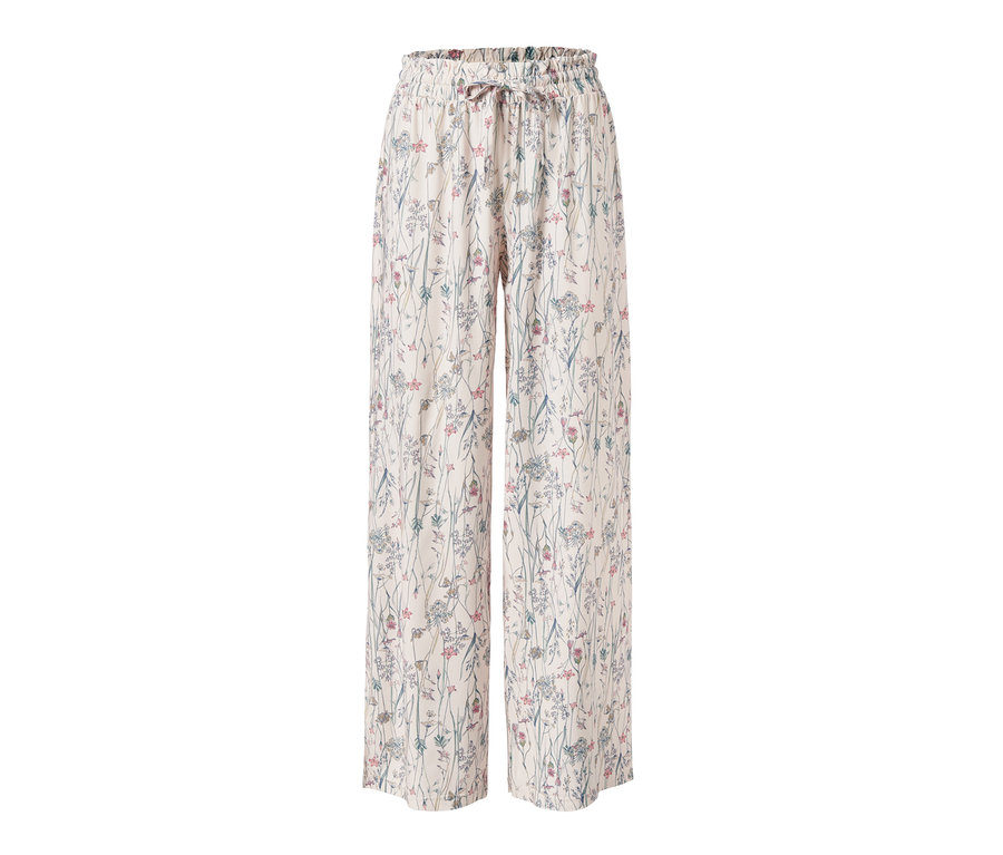 Cremefarbene Relaxhose mit Blumenmuster.