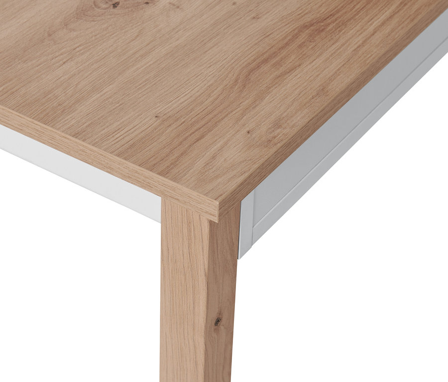 Detail einer Ecke eines Schreibtisches mit Schublade.