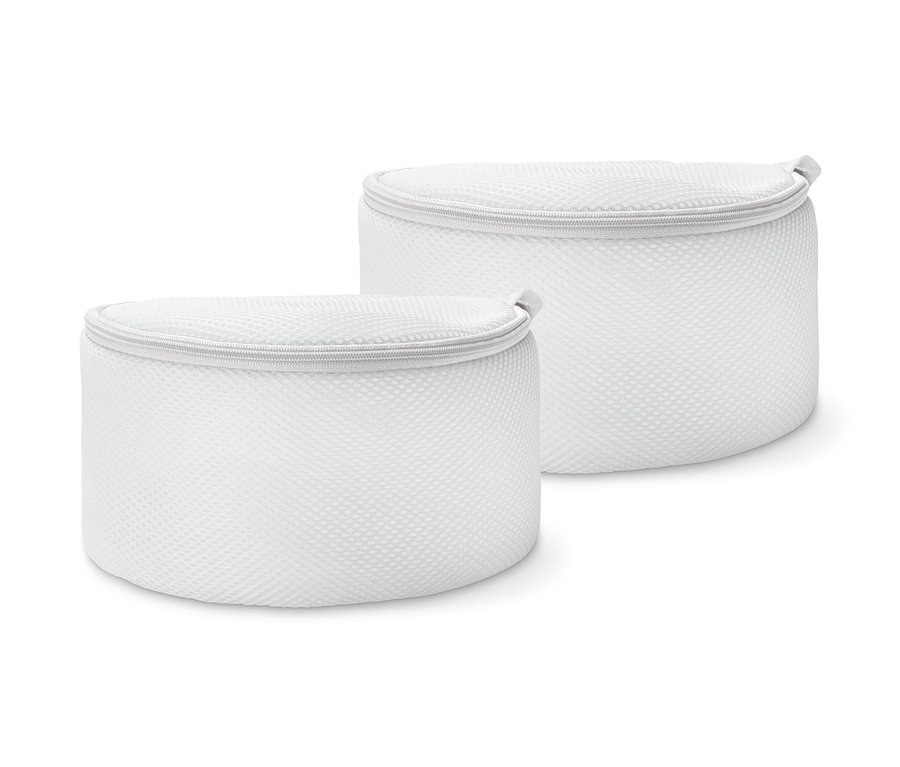 Zwei weiße BH-Wäschenetze.