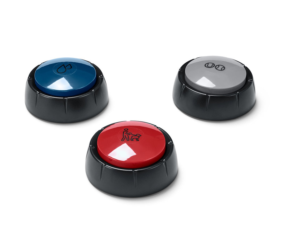 Drei Hunde-Trainingsbuttons in blau, grau und rot auf weißem Grund.