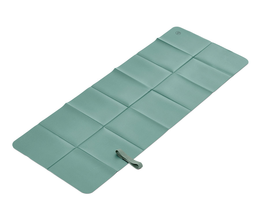 Eine grüne Falt-Yogamatte.
