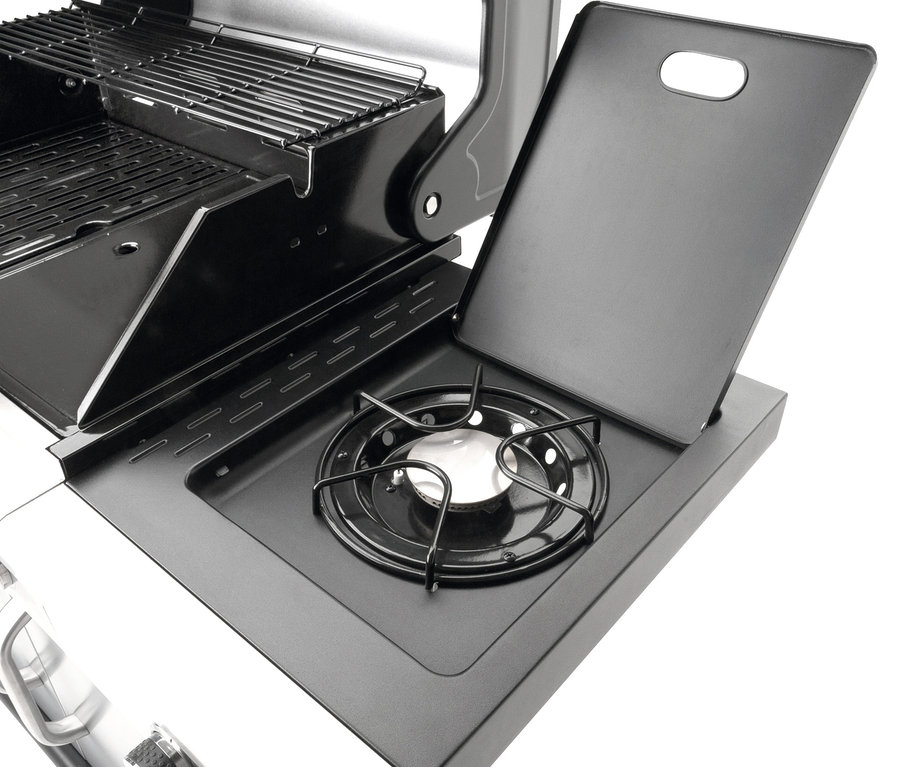 Detailaufnahme eines Landmann Gasgrills »Rexon 4.1 CooK« mit geöffnetem Seitenbrenner.