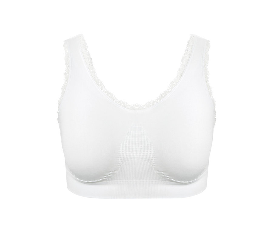 Ein weißes Seamless-Bustier mit Spitze liegt auf einem weißen Hintergrund.