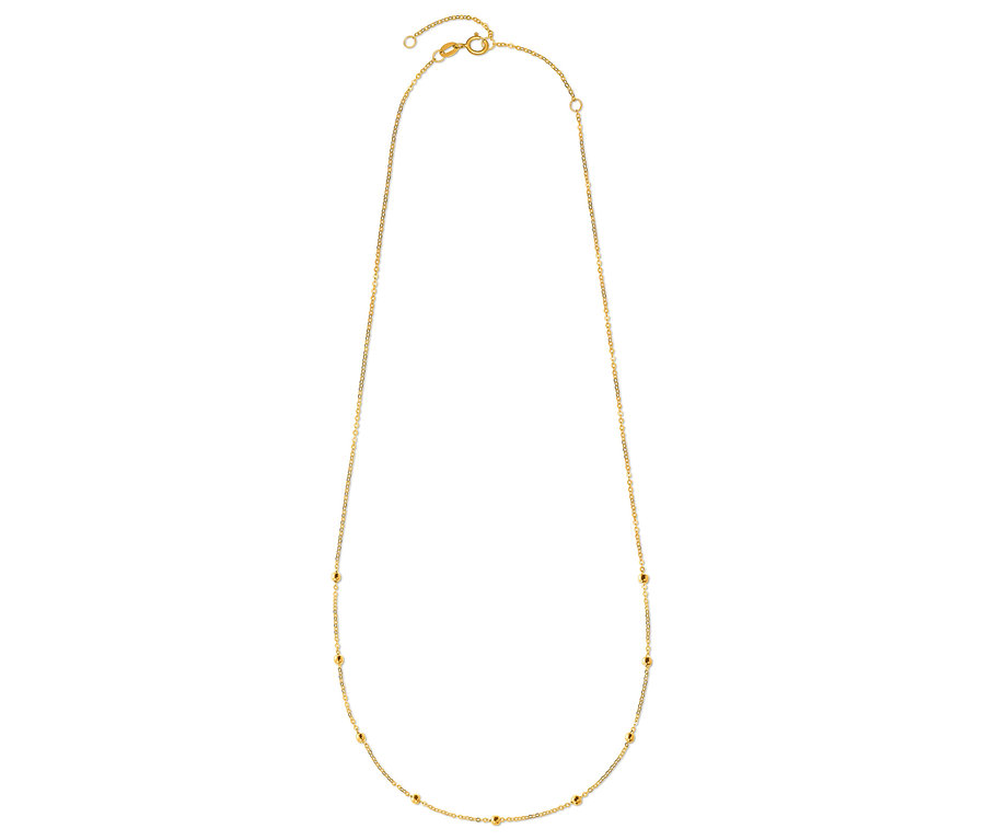 Goldene Halskette mit kleinen Kugeln entlang der Kette.