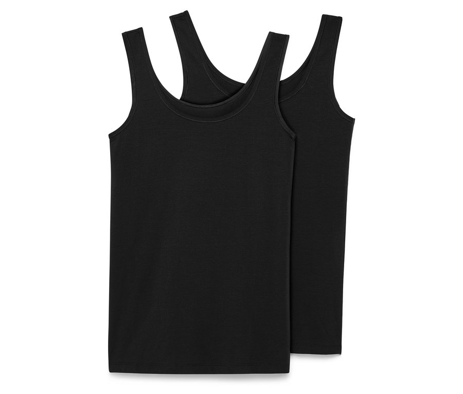 Zwei schwarze Hemdchen liegen übereinander.