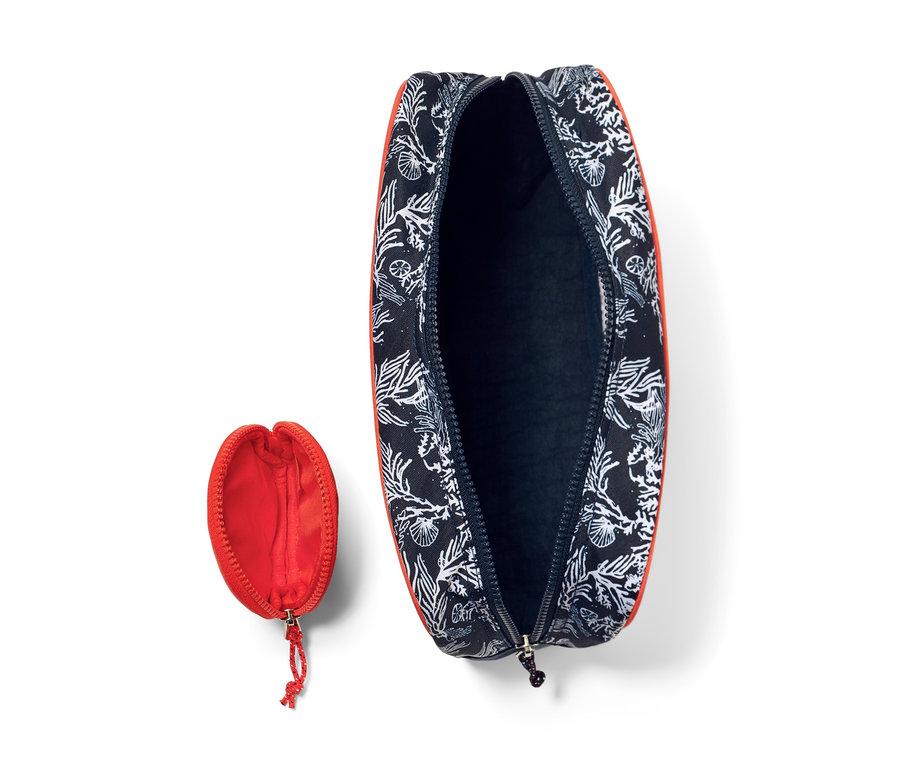Offenes Taschen-Set mit blau-schwarzem Korallenmuster und orangefarbenem Rand.