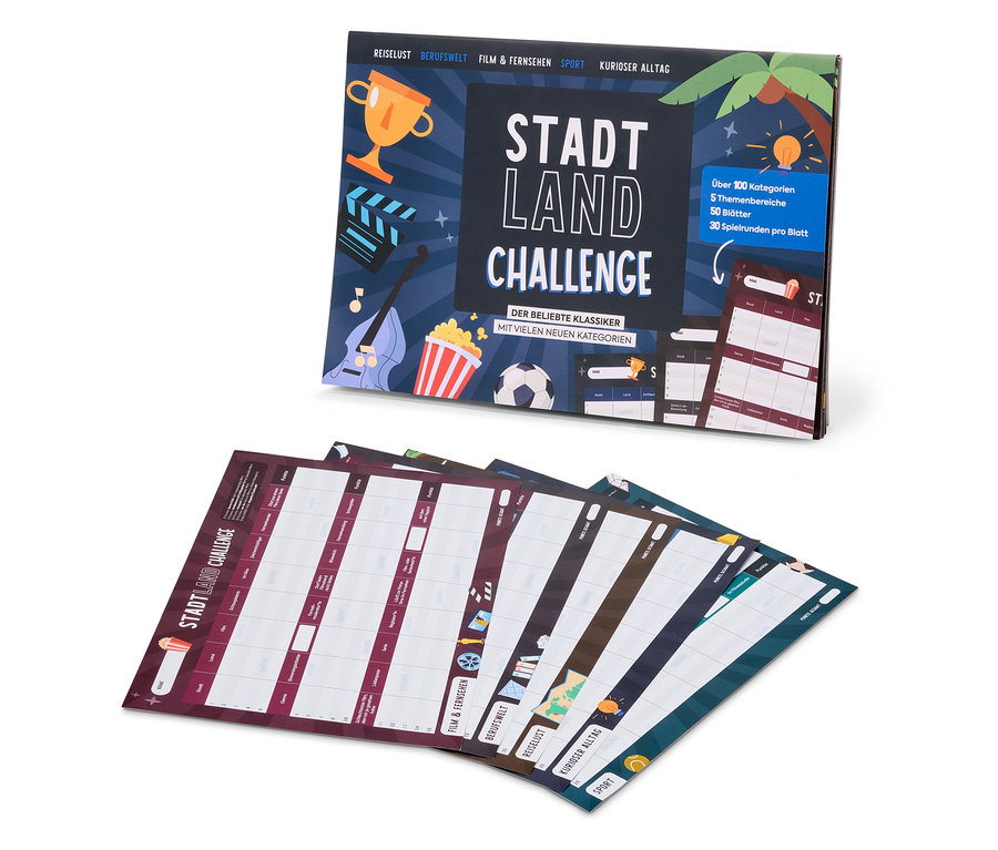 Eine Schachtel des Brettspiels Stadt, Land, Challenge und mehrere Spielblätter.
