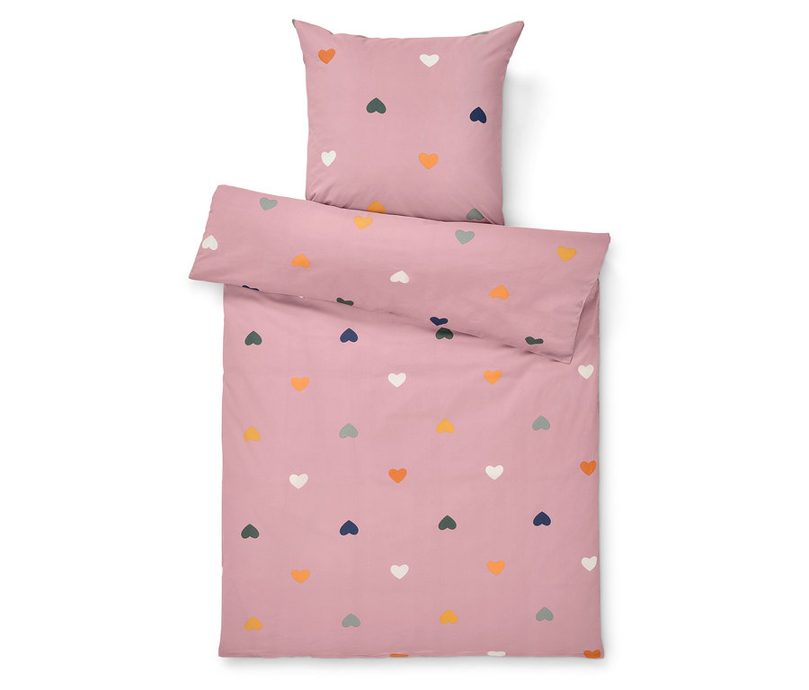 Rosa Bettwäsche mit bunten Herzen.
